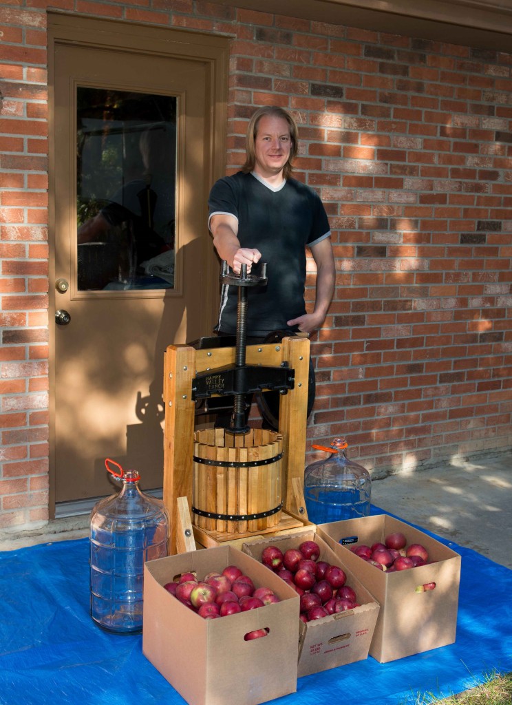 Yours truly with press, carboys, and Winesap and Rome apples.