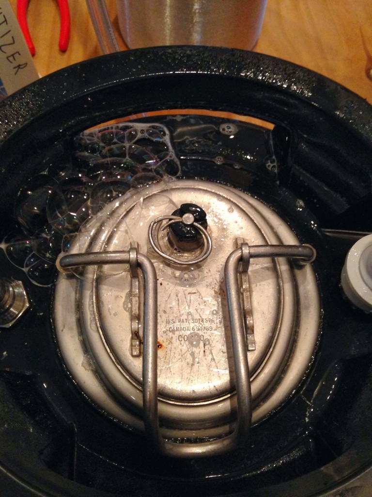 CO2 escaping from poorly-seated keg lid.